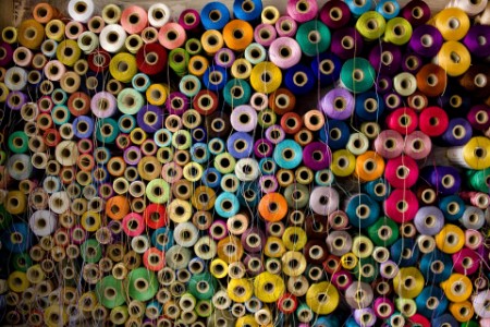 Colorful stack of Cotton Thread Reels